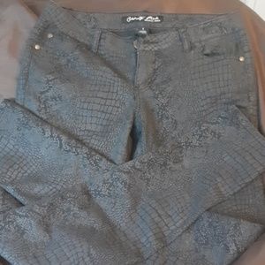 Celebrity pink snake skin print skinny jeans